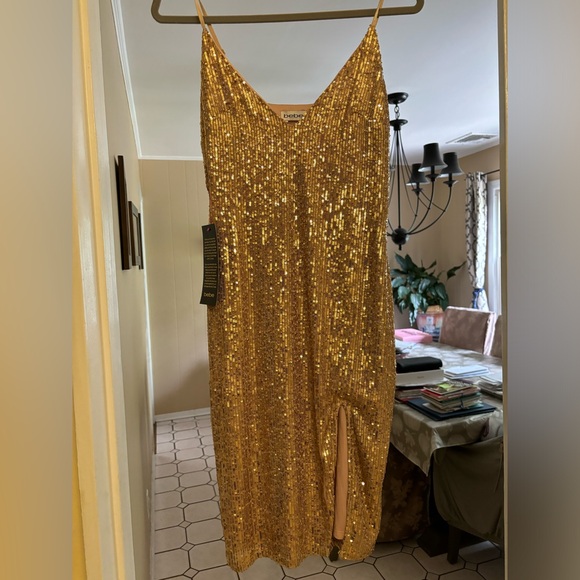 Brand new with tags Bebe gold sequined midi dress. I ordered a few dresses. - Picture 1 of 3